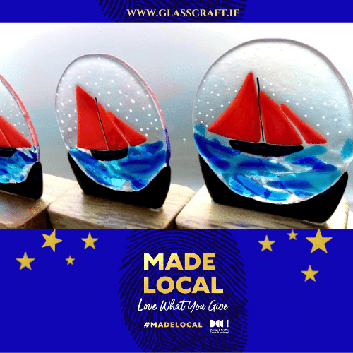 Red Sail Boat Snow Globe