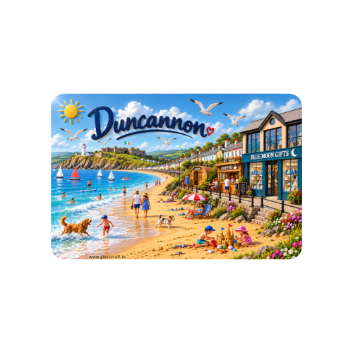 A rectangular printed card or plaque featuring a colorful illustrated beach scene labeled 'Duncannon' with blue sky, ocean, sandy shore, buildings, birds, and people. The card is centered on a plain white background.
