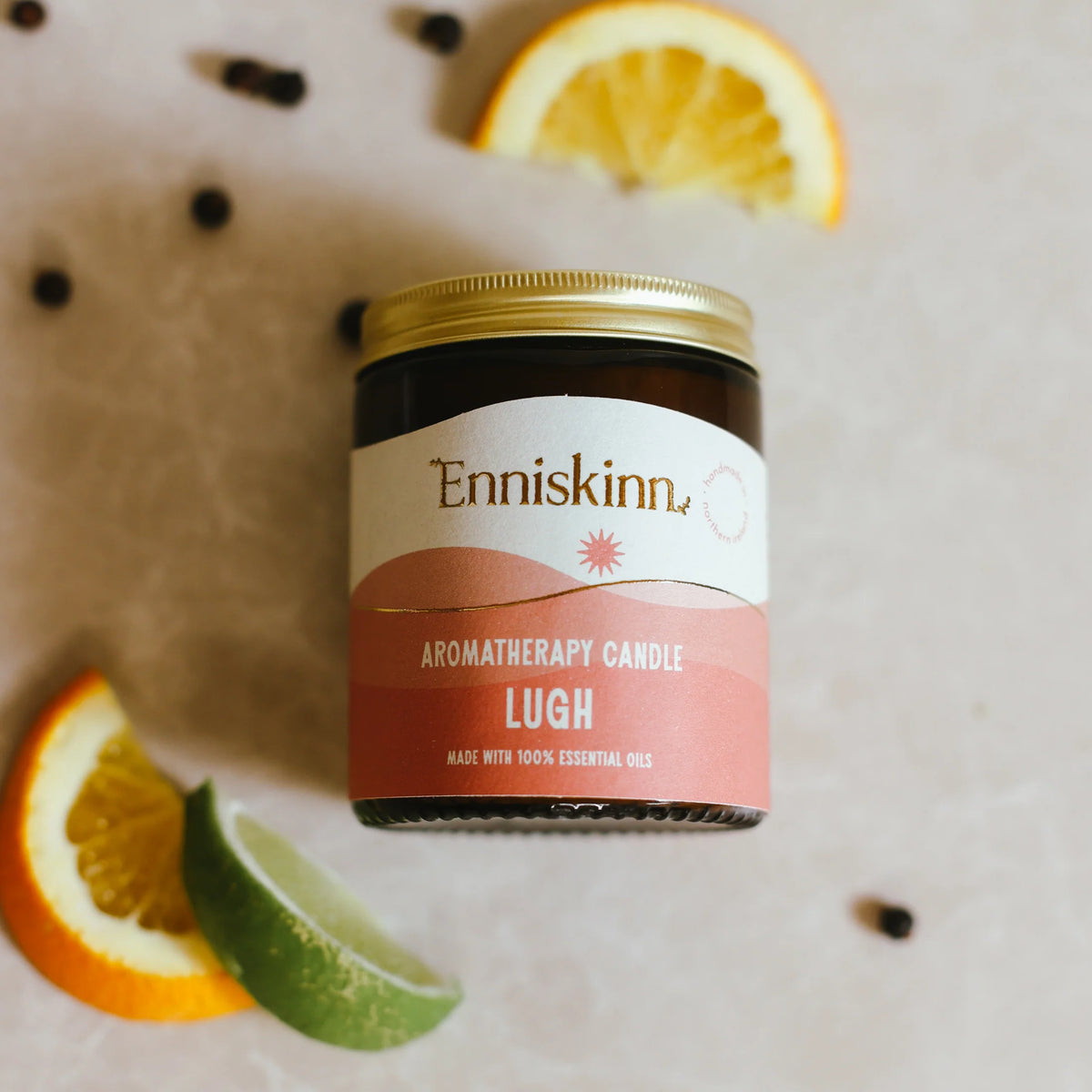 Enniskinn aromatherapy candle jar with sliced oranges and lime handmade in ireland