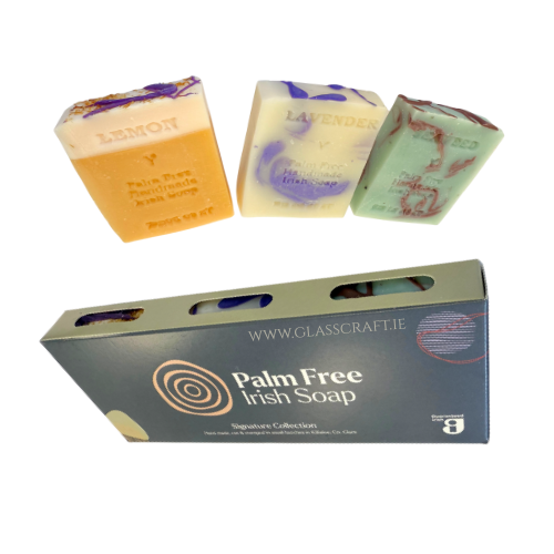 Three bars of soap with a box labeled 'Palm Free Irish Soap' on a white background