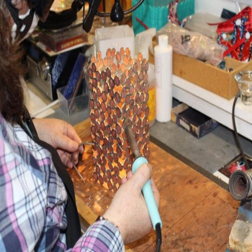 lamp made of coins Sue Donnellan